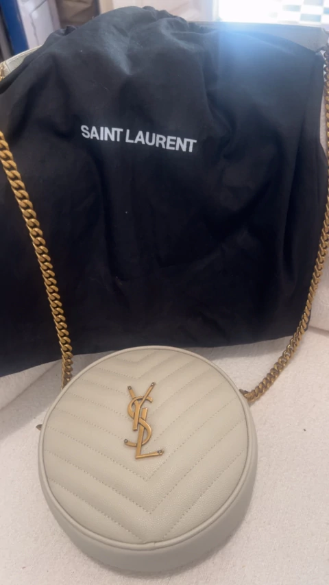 Cartera redonda Saint Laurent con funda sin uso
