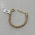 Pulseira Baiana Grossa 6MM Banhada Em Três Tons De Ouro - PL1416 - comprar online