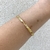 Bracelete Torcido No Meio Aro Aberto Banhado No Ouro/Ródio - PL263 - comprar online