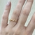 Anel Zig Zag Com Zircônias Banhada No Ouro - AN1328