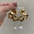 Brinco Flor Grande De Três Pétalas Com Corrente e Pérola Pendurada - BR3064 na internet