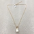 Colar Com Pingente De Pérola Barroca Com Base De Zircônias Lilás e Rosa Banhado No Ouro - CL2331 - comprar online
