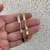 Bracelete Torcido No Meio Aro Aberto Banhado No Ouro/Ródio - PL263 - loja online