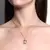 Colar Com Pingente De Menina Cravejada Com Zircônias Lilás Banhado No Ouro no - CL2048 - LAURA ASSUNÇÃO SEMIJOIAS 
