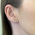 Brinco Ear Cuff Três Florzinhas De Zircônias Banhado No Ouro - BR2781
