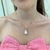 Colar Com Pingente De Pérola Barroca Com Base De Zircônias Lilás e Rosa Banhado No Ouro - CL2331 na internet