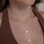 Choker Dupla Colar de Pérolas e Colar de Medalhinhas no Banho Ródio/Ouro - CK727 - LAURA ASSUNÇÃO SEMIJOIAS 