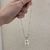 Colar Com Pingente De Pérola Barroca Com Base De Zircônias Lilás e Rosa Banhado No Ouro - CL2331 - loja online