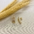 Brinco Retangular Filetes Vazados Banhado Em Três Tons De Ouro -BR2225 na internet