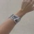 Imagem do Bracelete Orgânico Com Bordas Em Alto Relevo Banhado No Ouro/Ródio - PL1526