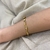 Bracelete Torcido Fino Prata/Dourado - PL995