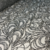 TUL BORDADO CON GLITTER ARABESCO GRIS MEDIO 296