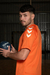 Remera de Entrenamiento NARANJA de Caballero HUMMEL
