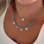 COLAR CHOKER RAISSA OLHO GREGO - Sou Estilo Bijuterias