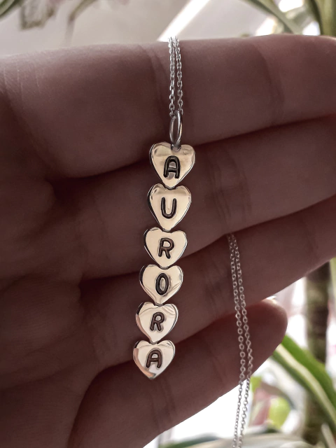 Dije Corazones vertical (no incluye cadena)