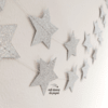 Guirnalda estrellas plateadas glitter 1,5mts aprox.