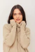 POLERON ORISHO BEIGE en internet