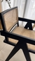 Silla de madera negra JEANNERET con esterilla rattan