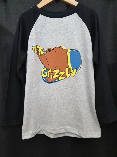 Remera Niño M/Largas Escandalosos Pardo