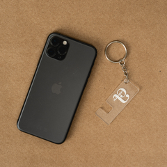 Llavero de acrðlico apoya celular con logo - Komuk Argentina