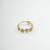 Anel design delicado de flores com detalhe cravejado , regulável , banhado a ouro 18k na internet