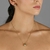 Conjunto de colar e brinco modelo gota ou virgula, banhado a ouro 18K - comprar online