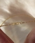 PULSEIRA CORDA DE VIOLÃO FEMININA COM VÁRIAS VOLTAS, DOURADA BANHADA A OURO 18K na internet