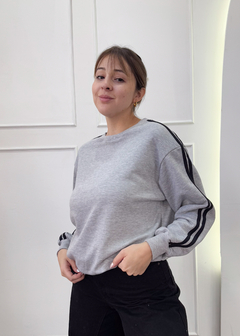 BUZO FRIDA TIRA (011346) en internet