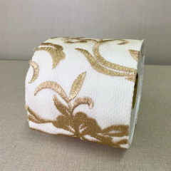 Capa de papel higiênico dourada