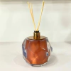 Porta Difusor lapidado em resina cristal red gold com red gold