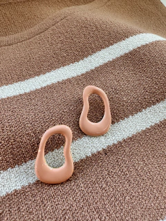 Brinco esmaltado orgânico