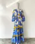 Vestido longo Bobstore novo com estampa colorida de flores e detalhes em azul e amarelo.
