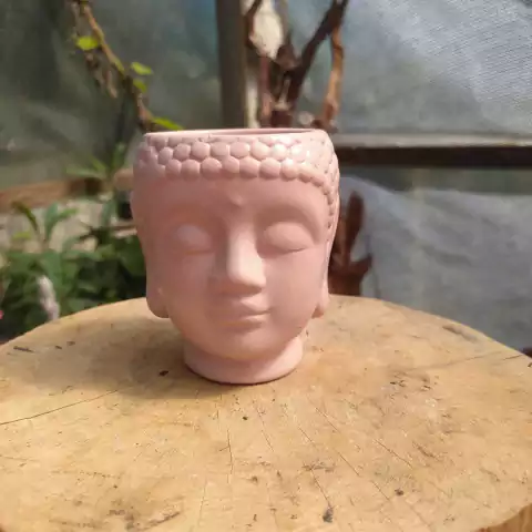 Vaso de cerâmica buda