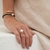 Pulseira com Amarração em Pedras Malaquita, Pérola barroca e Bolinhas em Ouro 18k