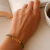 Pulseira Prata com Banho de Ouro, Contas e Palavras na internet