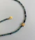 Colar Ouro 18K com Amarração e Pedras em Turmalina Azul 2mm e Estrela Central - comprar online