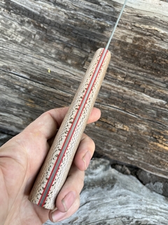 Gyuto Inox y Radal con separadores rojos en internet