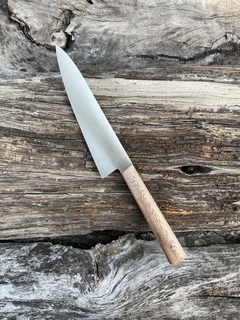 Gyuto Inox y Radal con separadores rojos en internet