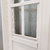 Puerta de chapa FORTUNA CLASICA 11304 con media ventana-postigo de abrir 0.90x2.05m - tienda online