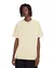 Camiseta Nike Sportswear Premium Essentials na cor bege, modelo unissex, com logo da Nike em destaque no peito.