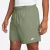 Shorts Nike Club Flow em tom verde, com elástico na cintura e logo Nike em branco.