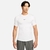 Camiseta Nike Pro Tight branca, com design justo e logotipo preto, ideal para atividades físicas.
