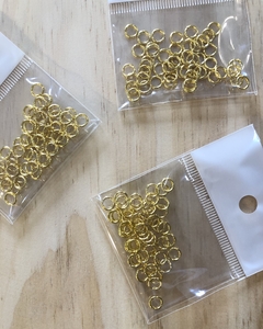 ARGOLLITAS DORADAS 5 MM. 50 UNIDADES