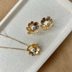 CONJUNTO FLOR MEIO PEROLA DOURADO - comprar online