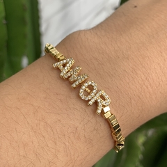 PULSEIRA REGULÁVEL QUADRADINHOS ESCRITO AMOR DOURADO - comprar online