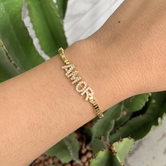 PULSEIRA REGULÁVEL QUADRADINHOS ESCRITO AMOR DOURADO