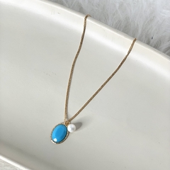 GARGANTILHA PINGENTE OVAL TURQUESA E PEROLA DOURADO na internet