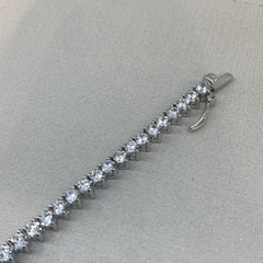 PULSEIRA RIVIERA ZIRCÔNIA 3 GARRAS RÓDIO BRANCO na internet