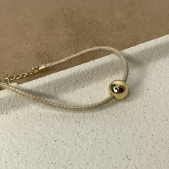 PULSEIRA COURINHO ESFERA DOURADO na internet