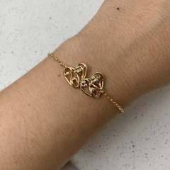 PULSEIRA 2 CORAÇÕES DESENHADO VAZADO PONTO ZIRCÔNIA DOURADO
